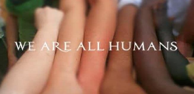 Lickey End facebook group image - human arms of different skin tones with the words WE ARE ALL HUMANS in white